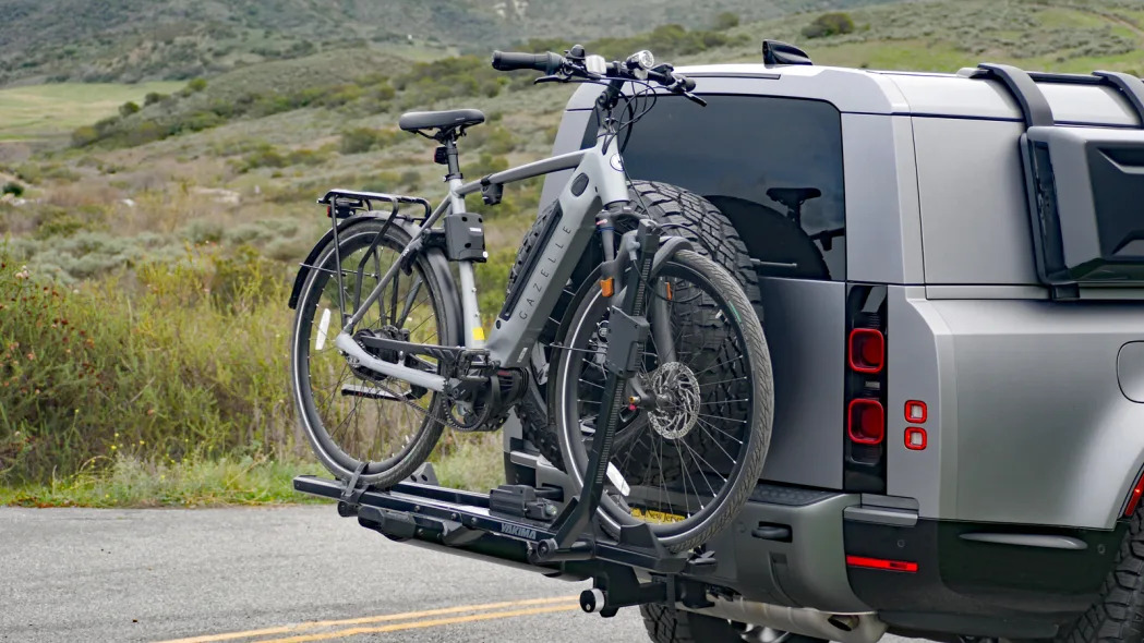 Land Rover Defender 130 Outbound with Yakima bike rack and Gazelle e-bike