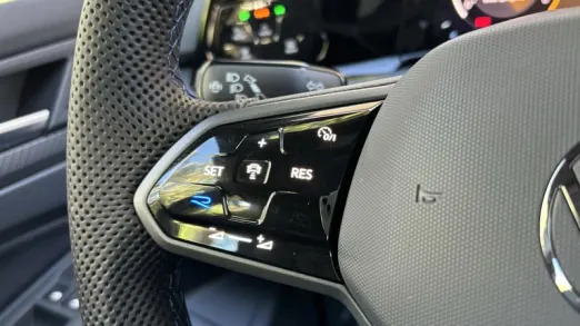 2024 Volkswagen Golf R touch buttons on wheel
