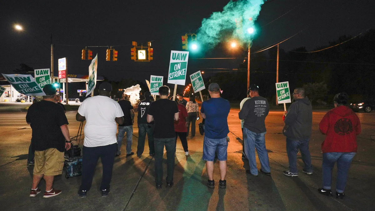 FLINT, MI - SEPTEMBER 16: United Auto Workers (UAW) members picket at a gate at the General Motors Flint Assembly Plant after the UAW declared a national strike against GM at midnight on September 16, 2019 in Flint, Michigan. It is the first national strike the UAW has declared since 1982. (Photo by Bill Pugliano/Getty Images)