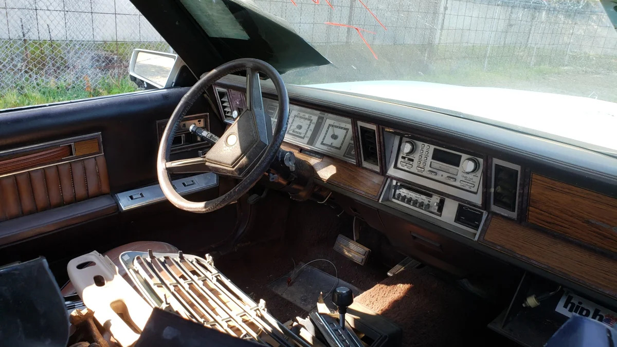 37 - 1982 Chrysler LeBaron convertible in California junkyard - photo by Murilee Martin