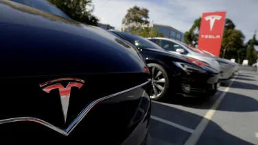 Tesla owners sue, say software updates cut range by 20%, break batteries