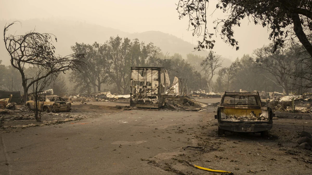 ASHLAND, OR - SEPTEMBER 11: Burnt automobiles and a fire hose sit in a mobile home park on September 11, 2020 in Ashland, Oregon. Hundreds of homes in Ashland and nearby towns have been lost due to wildfire. (Photo by David Ryder/Getty Images)