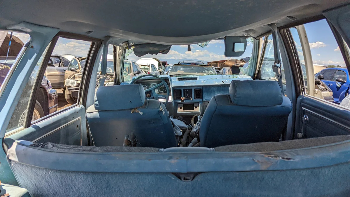 43 - 1981 Ford Escort station wagon in Colorado junkyard - photo by Murilee Martin