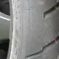 Look at tires for signs of uneven wear or other damage