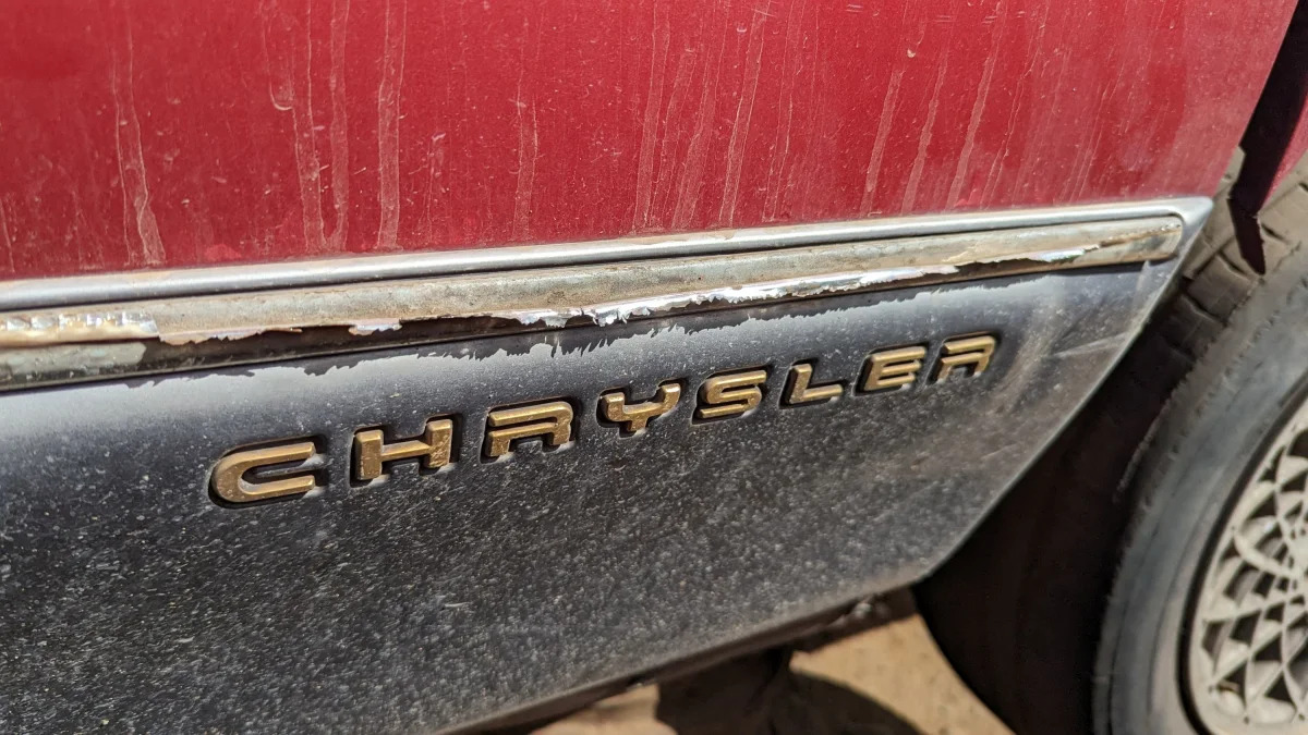 17 - 1995 Chrysler New Yorker in Arizona junkyard - photo by Murilee Martin