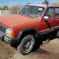 31 - 1990 Jeep Cherokee XJ in Colorado junkyard - photo by Murilee Martin
