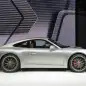 The 2016 Porsche 911 Carrera, now with a turbocharged engine in the standard car, unveiled at the Frankfurt Motor Show, side view.