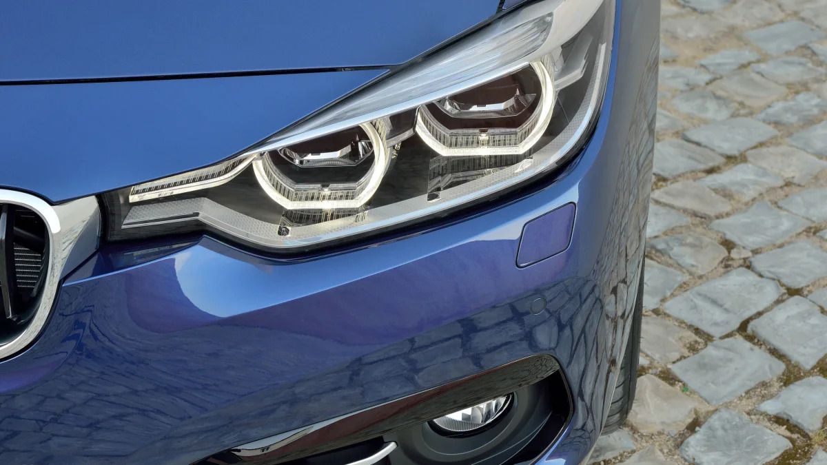 blue 2016 bmw 3 series refresh headlights closeup