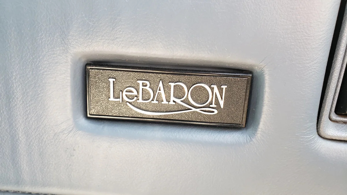 23 - 1988 Chrysler LeBaron in Colorado junkyard - photo by Murilee Martin