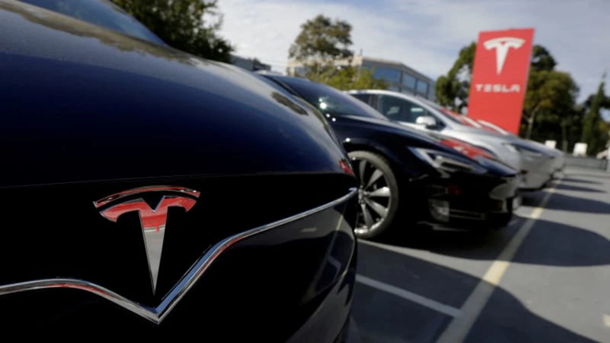 Tesla owners sue, say software updates cut range by 20%, break batteries