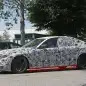camouflaged bmw m5 spy shots wheels and brakes