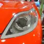Elio Motors orange trike front headlight