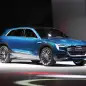 The Audi E-Tron Quattro concept is revealed to the press at Volkswagen Group Night ahead of the 2015 Frankfurt Motor Show, front three-quarter view, passenger side.