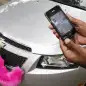 The Lyft app allows users to request a ride in Miami on June 4, 2014. Regulators across the U.S. and in Europe are struggling with how to control the digital-dispatch services that have upended the transportation business. © Jose A. Iglesias/Miami Herald/MCT/Alamy Live News