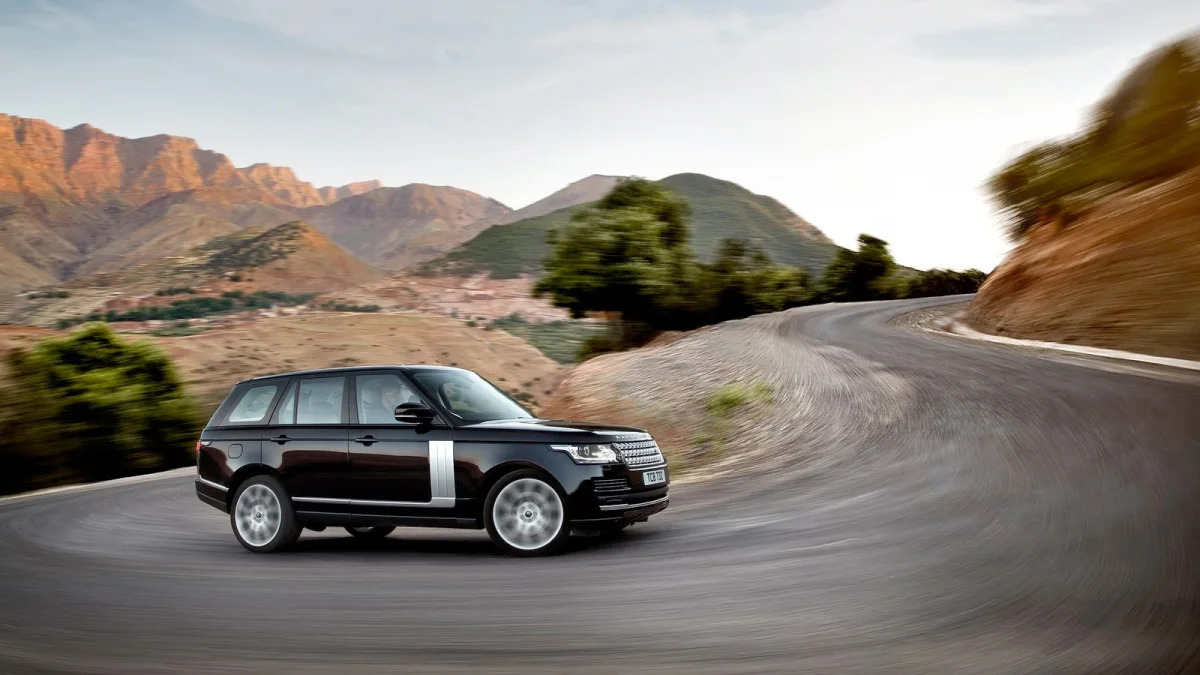 2015 Range Rover in black on a winding road