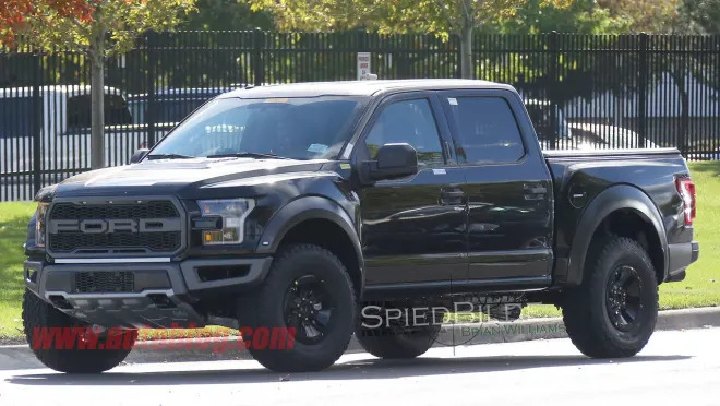 ford raptor camo jacked up