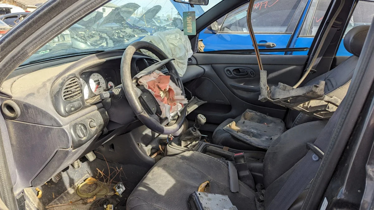 11 - 1998 Ford Contour SVT in Colorado junkyard - photo by Murilee Martin