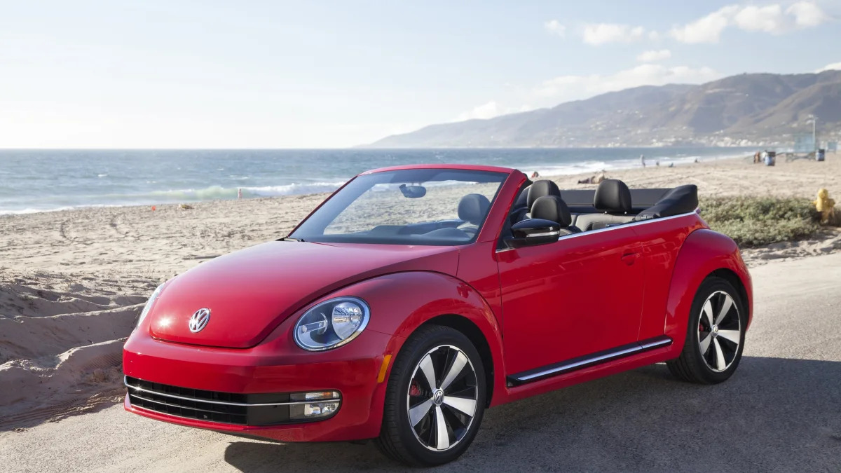 2015 VW Beetle convertible in red on the beach