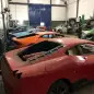 This July 15, 2019 photo released by Itajai Civil Police shows luxury car replicas inside a workshop in Itajai, Brazil. Brazilian police dismantled the clandestine workshop run by a father and son who assembled fake Ferraris and Lamborghinis to order, in Brazil's southern state of Santa Catarina. (Itajai Civil Police via AP)