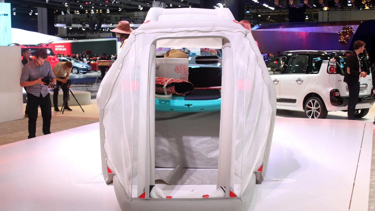 The Citroen Cactus M Concept at the 2015 Frankfurt Motor Show, rear view looking into the cabin through the tent.