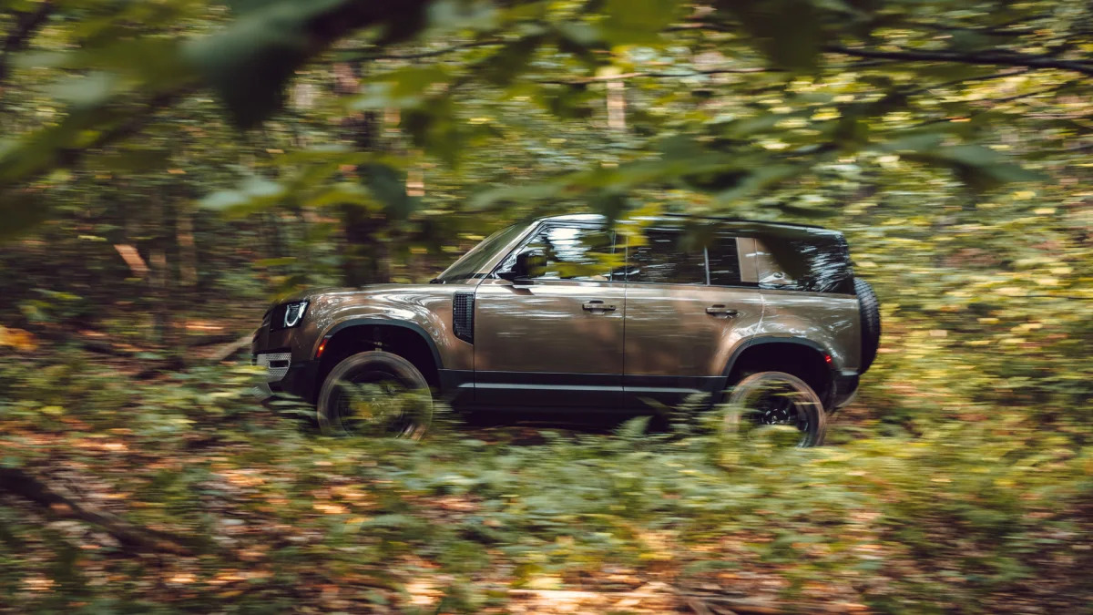 2020 Land Rover Defender brown action profile off road