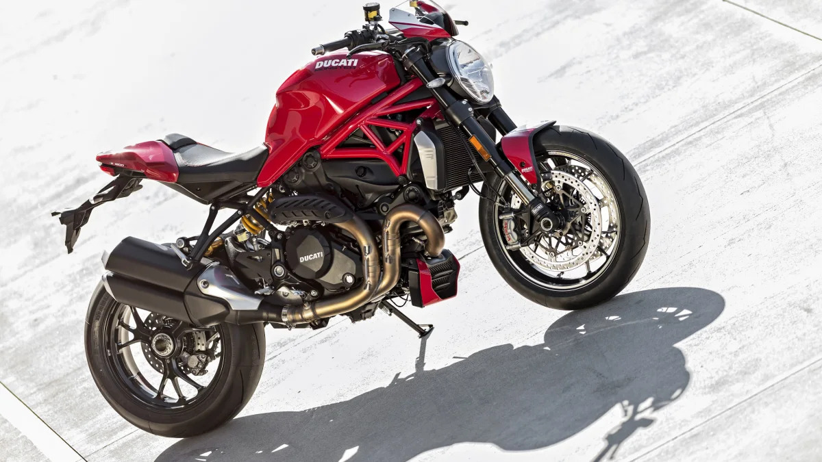 red ducati monster 1200 r on concrete