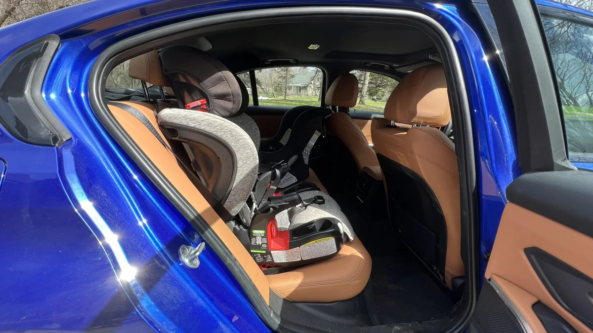2022 BMW 330e with front-facing seat behind passenger