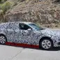 camouflaged audi a4 allroad spy shots front three quarters