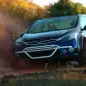 Kia Forte Koup Mud Bogger Concept driving mud off-road