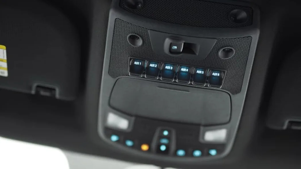 The all-new F-150 Raptor houses auxiliary switches to control aftermarket equipment such as lights or an air compressor out of the driverÃ¢ÂÂs way mounted in the cabÃ¢ÂÂs overhead console, similar to a fighter plane.