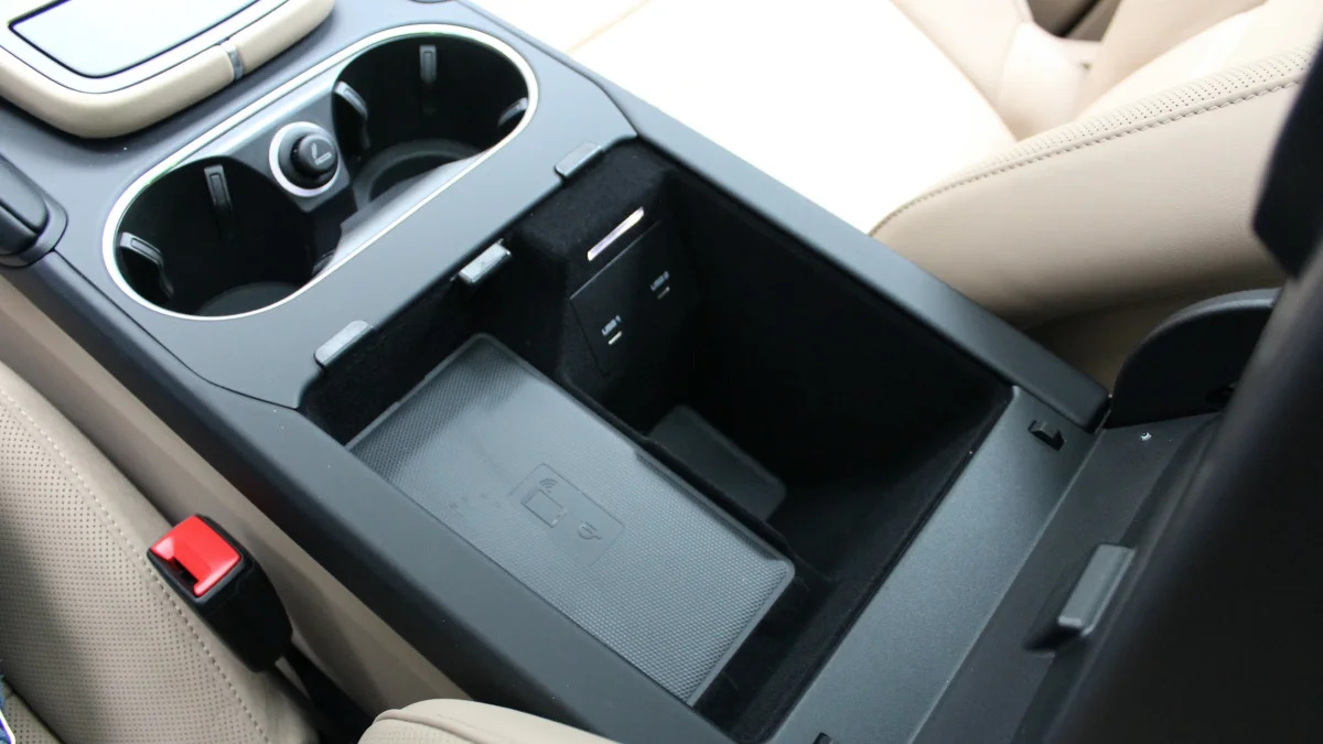 2021 Porsche Cayenne E-Hybrid center console storage with wireless phone charger