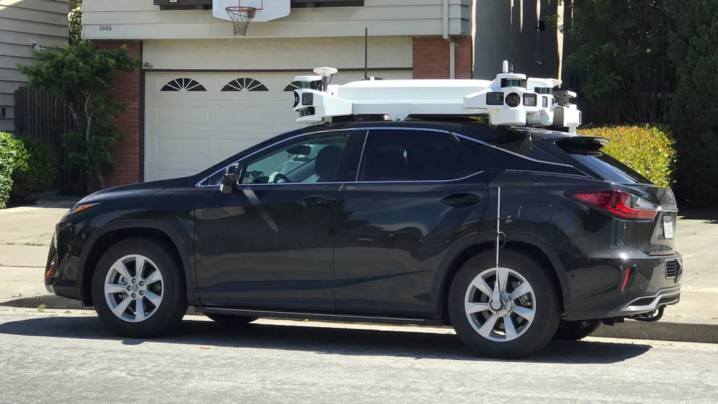 Sunnyvale, California, USA - May 22, 2019: Lexus RX450h on suburban street with Apple Project Titan autonomous vehicle hardware mounted on roof. (Image Credits: NNehring/Getty Images)