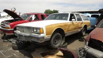 1987 Pontiac Safari station wagon in Colorado junkyard