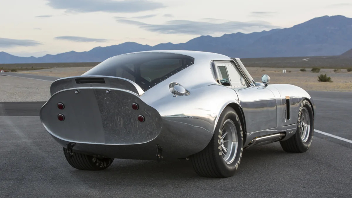 The aluminum Shelby American Continuation Daytona Coupe, rear three-quarter view.