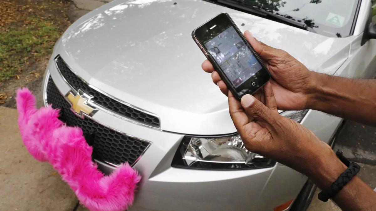 The Lyft app allows users to request a ride in Miami on June 4, 2014. Regulators across the U.S. and in Europe are struggling with how to control the digital-dispatch services that have upended the tr
