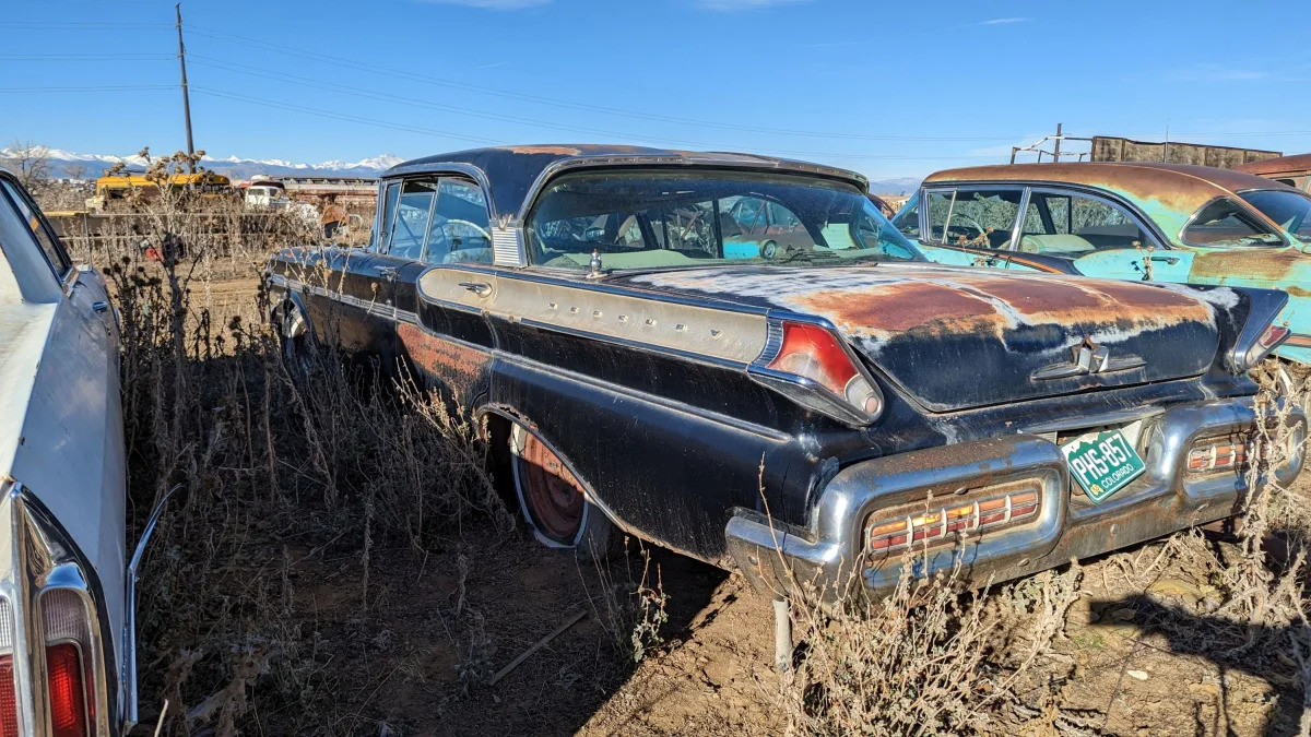 35 - 1957 Mercury Montclair Phaeton Sedan in Colorado junkyard - photo by Murilee Martin