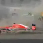 Japan F1 GP Auto Racing (Marussia driver Jules Bianchi, front, and Caterham driver Giedo van der Garde of the Netherlands crash at the start of the Japanese Formula One Grand Prix at the Suzuka circui