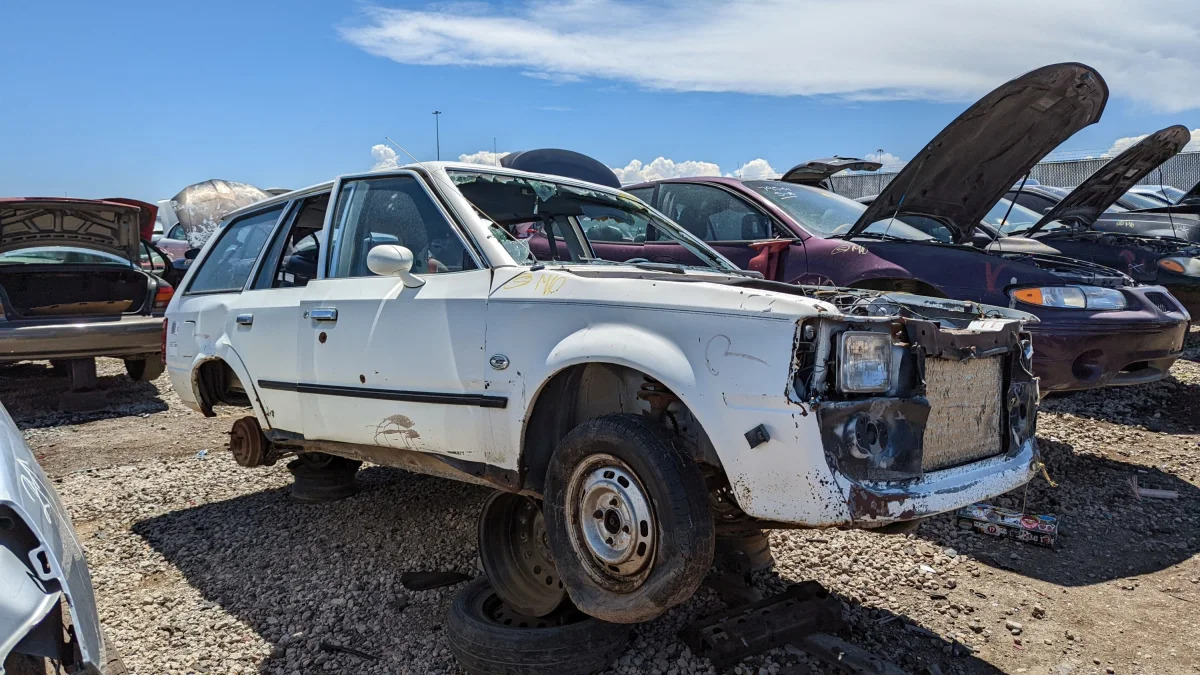 31 - 1981 Ford Escort station wagon in Colorado junkyard - photo by Murilee Martin