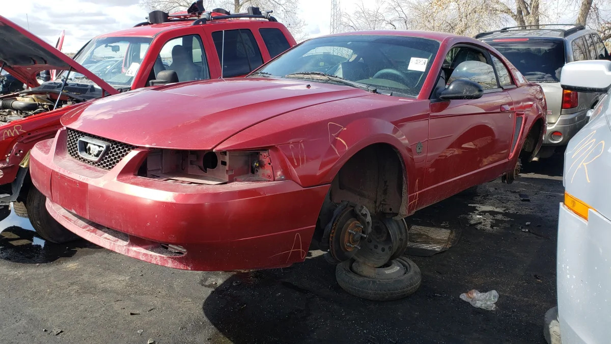 16 - 2004 Ford Mustang in Colorado junkyard - photo by Murilee Martin