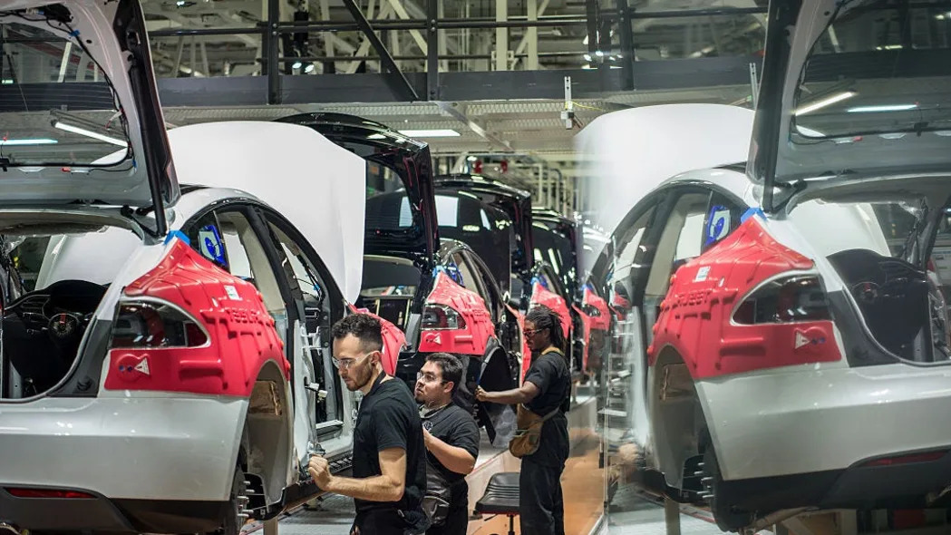 Tesla factory workers got a pay bump in January.