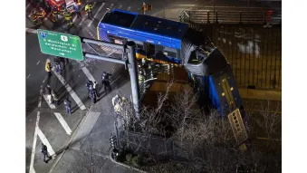 NYC articulated bus plunges off bridge