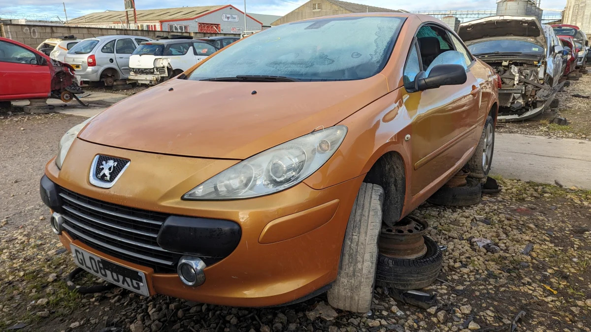 21 - 2006 Peugeot 307CC in British wrecking yard - photo by Murilee Martin