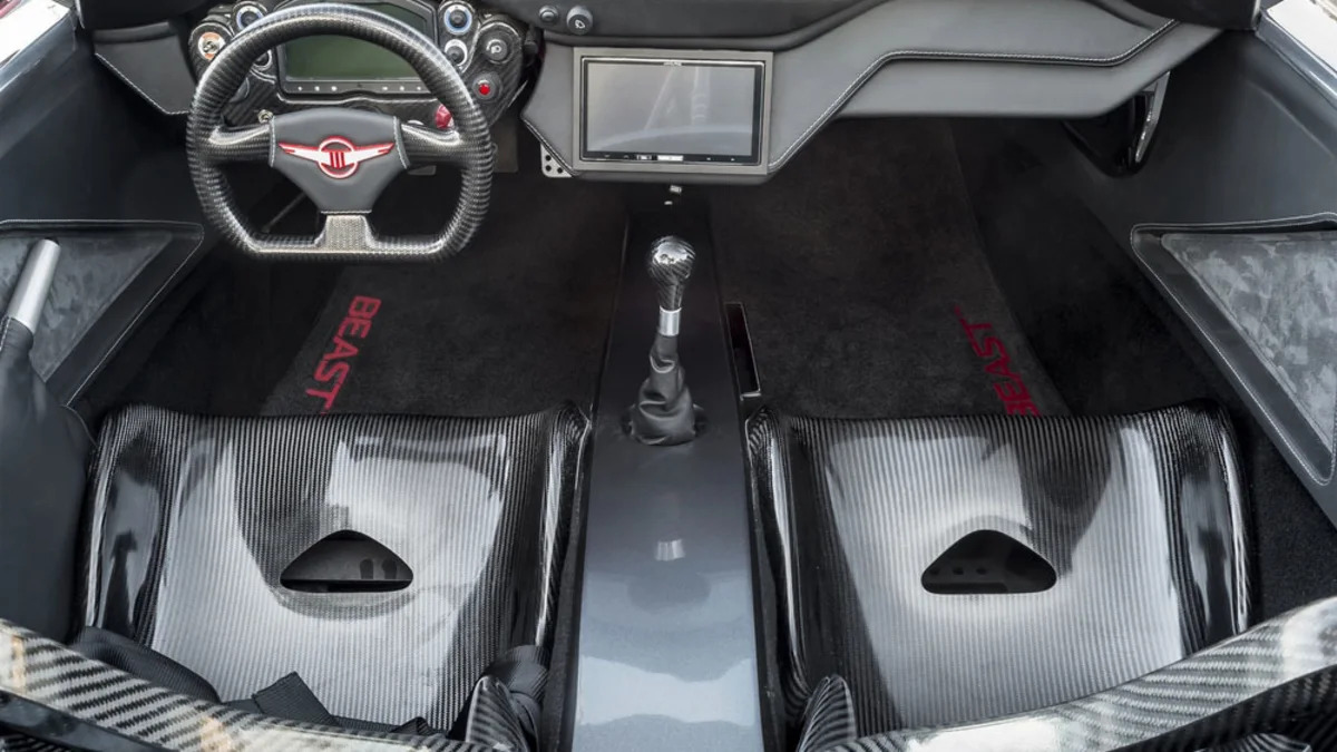 gray rezvani motors beast interior seats and dashboard